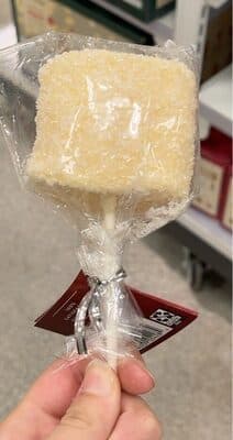 White chocolaty coated with crystal sprinkles marshmallow